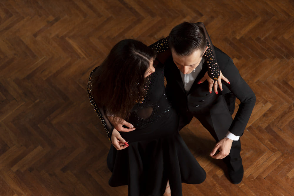man-woman-dancing-together-ballroom-scene a luxury man and woman dancing together